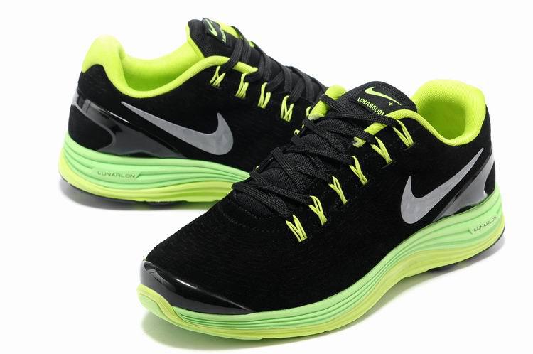 nike black and green running shoes